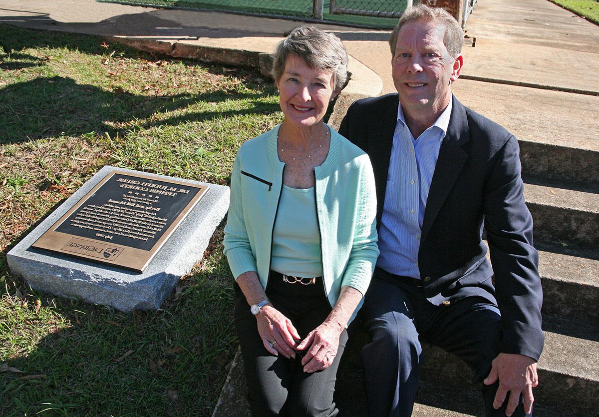 {Bill and Becky Manuel pose for a photo after a dedication ceremony.}